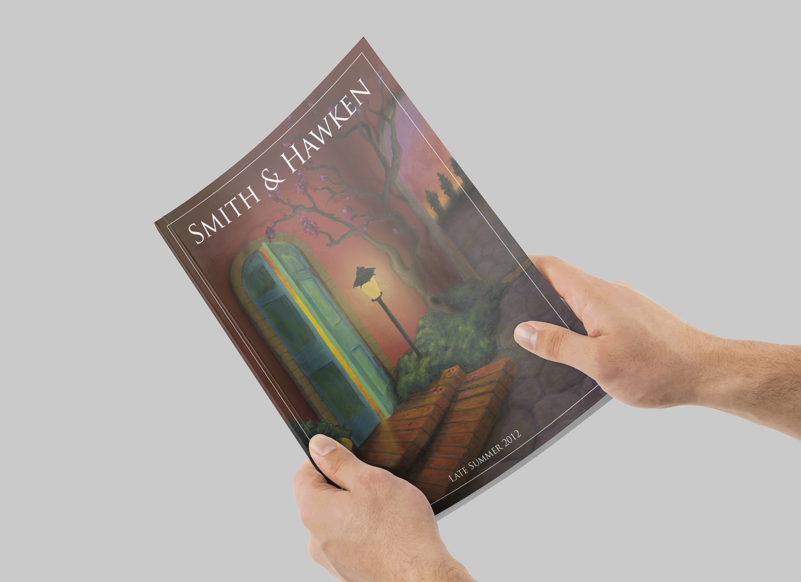 Hands holding a Smith & Hawken catalog cover (late 2012 edition)